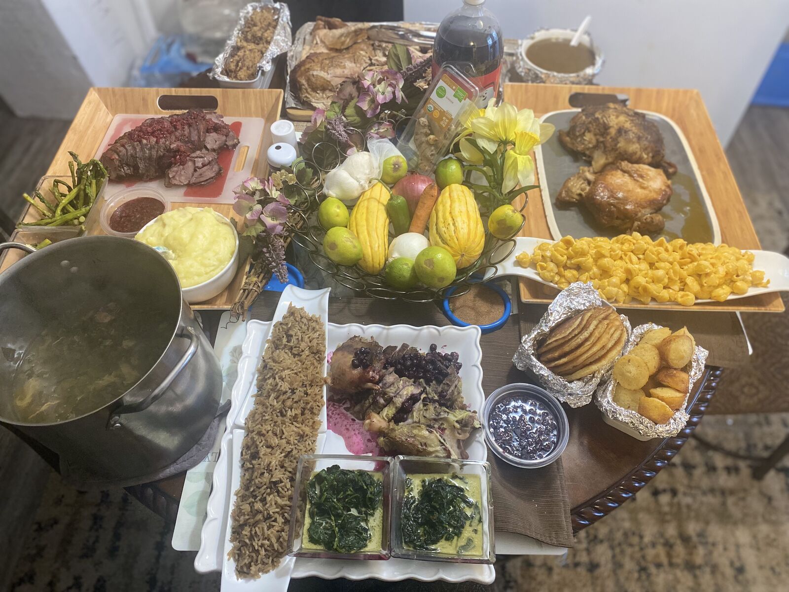 Catered holiday table with meats, sides and desserts